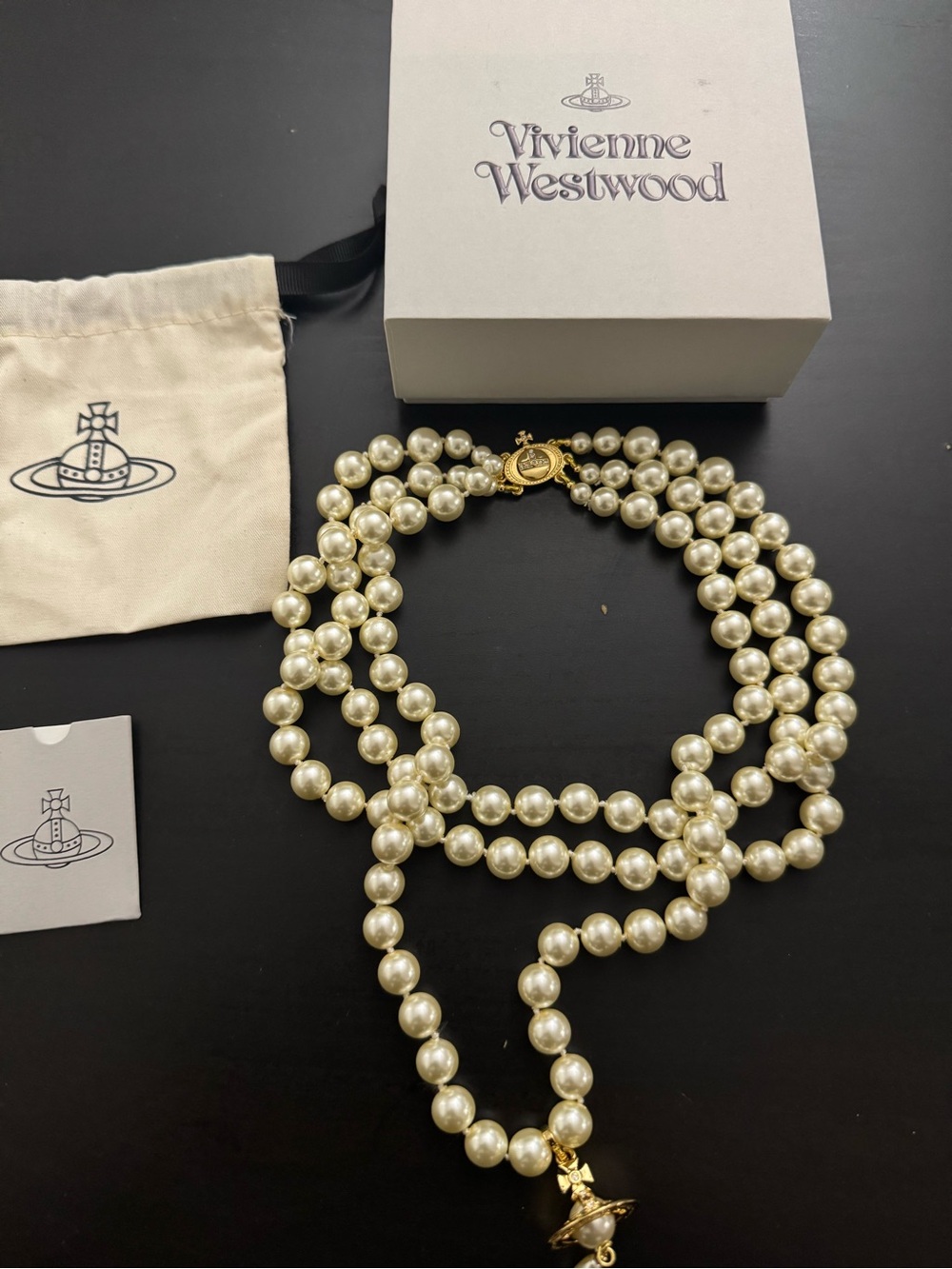Vivienne Westwood Three row bas relief pearl necklace in gold